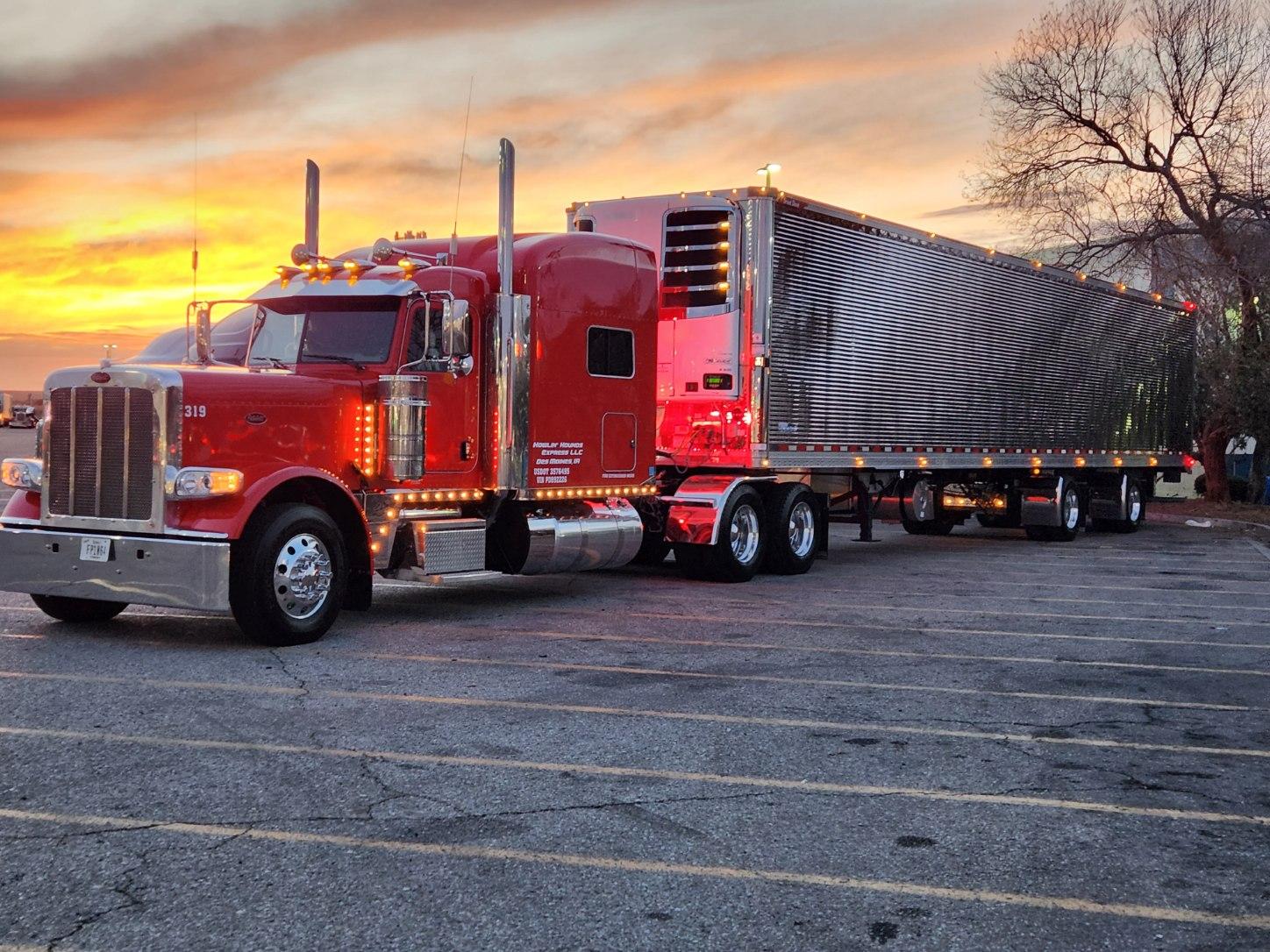 Red Howlin Hounds Express Peterbilt at sunset